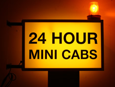 24 hour mini cabs sign with flasher for hire