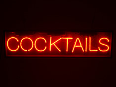 red neon cocktails hrie sign