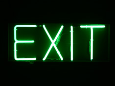 green neon exit hire sign